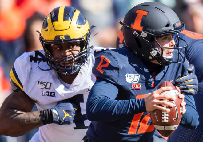 Michigan defensive end Mike Danna and the U-M defense smothered Illinois' offense with four sacks Saturday.