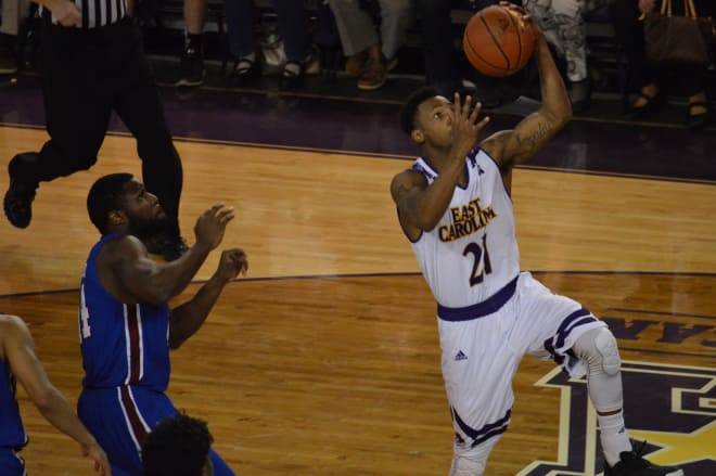 ECU's B.J. Tyson drives for two of his twelve points in the Pirates' 76-56 win over Presbyterian.