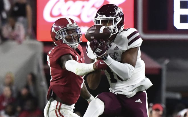 Alabama Crimson Tide defensive back Eli Ricks (7) breaks up a pass intended for Mississippi State Bulldogs wide receiver Justin Robinson (18) during the first half at Bryant-Denny Stadium. Photo |  Gary Cosby Jr.-USA TODAY Sports