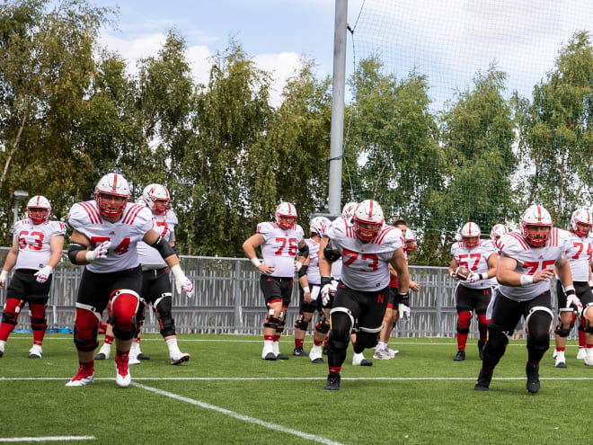 Nebraska's offensive line goes through conditioning drills in Ireland.