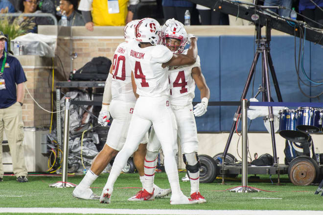 Solomon Thomas and Frank Buncom celebrate with Quenton Meeks after Meeks' interception return for a touchdown at Notre Dame.