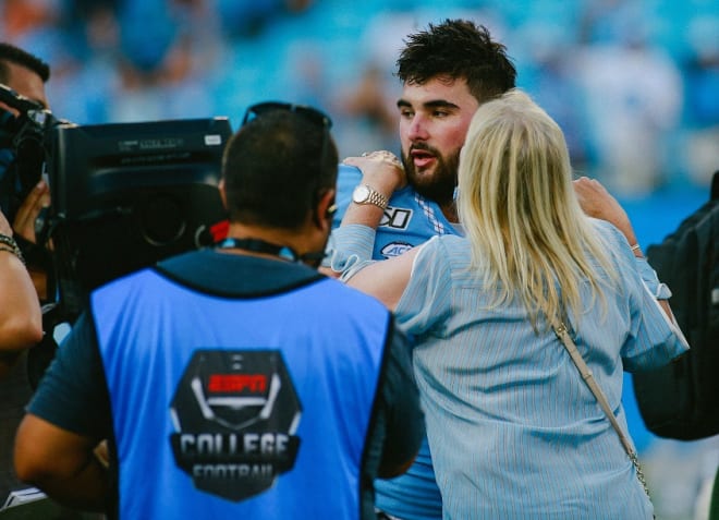 Sally Brown shows Howell some appreciation after the game. 