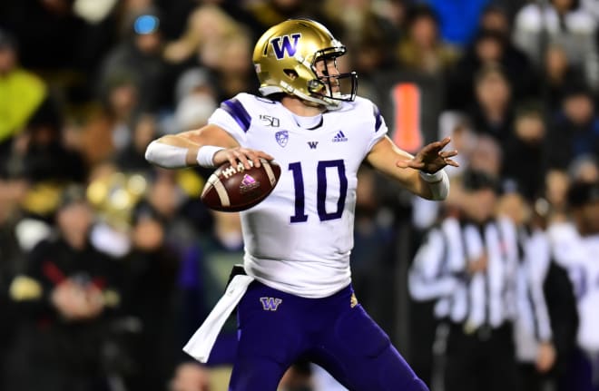 Washington Huskies quarterback Jacob Eason (10) drops back to pass the ball against the Colorado Buffaloes in the first quarter at Folsom Field. Photo Credit: Ron Chenoy-USA TODAY Sports