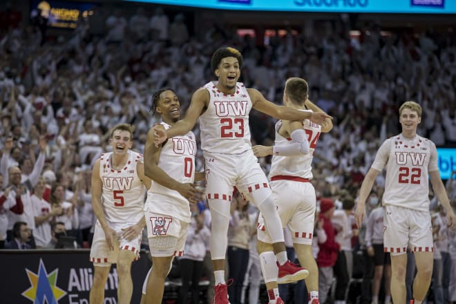 Chucky Hepburn (23) celebrates his game-winning 3-pointer on Tuesday, giving the Badgers a share of the Big Ten title.