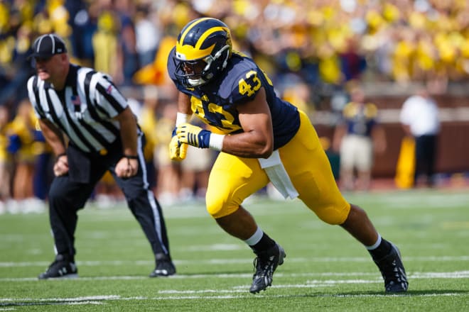 Michigan's Chris Wormley will play for John Harbaugh in Baltimore.