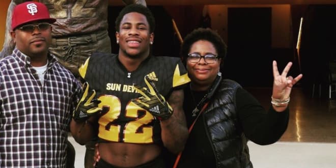 City College of San Francisco running back with his family members during his recent ASU official visit