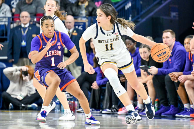 Notre Dame guard Sonia Citron (11) drives past Clemson's Dayshanette Harris (1) Thursday night during a 74-47 Irish victory.