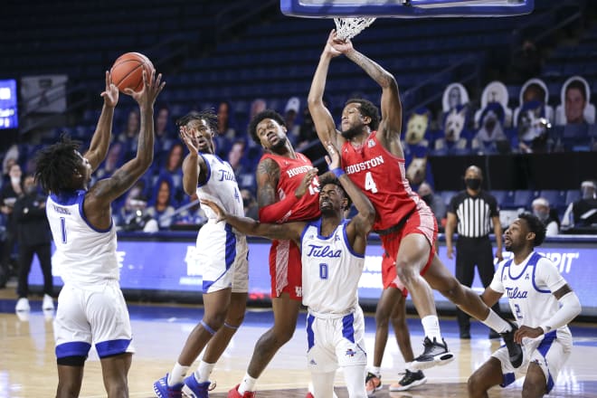 Brandon Rachal grabs a rebound against Houston.