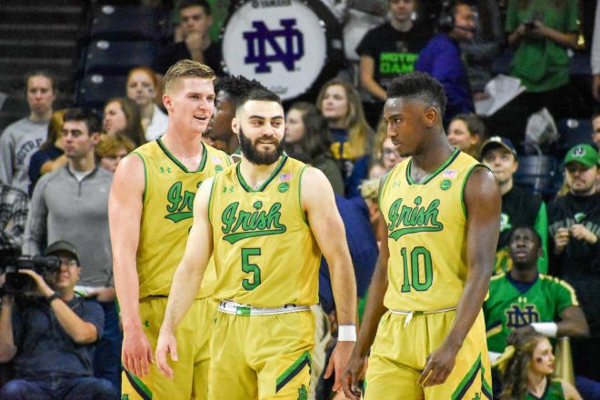 From left to right, guards Rex Plueger, Matt Farrell and T.J. Gibbs have helped the No. 5 Irish get off to a 6-0 start.