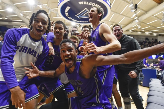 Furman Paladins forward Noah Gurley (center) celebrates with teammates after a victory against the Villanova Wildcats at Finneran Pavilion. Photo | Derik Hamilton-USA TODAY Sports