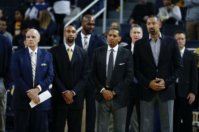 Michigan Wolverines basketball's coaching staff is on the road this weekend. 