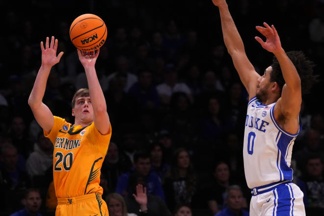 Duke's Jared McCain contests a shot by Vermont's TJ Long during Friday night's game. 