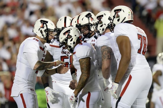 QB Nic Shimonek readies the Tech O-line for their final drive of the game against ASU, going on to score and seal the win, 52-45.