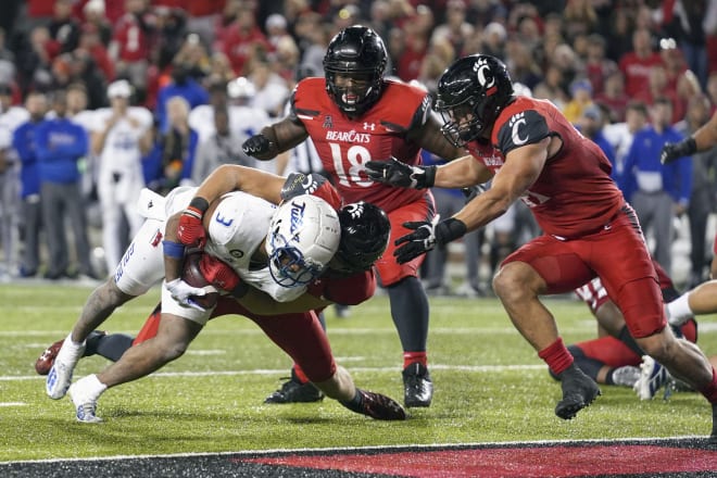 Tulsa RB Shamari Brooks is stopped short of the goal line.