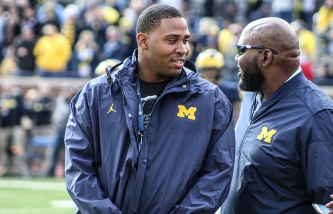 Four-star offensive tackle Kai-Leon Herbert is committed to Michigan but looking at other schools.