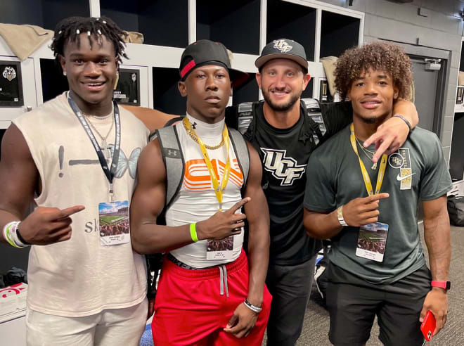 Jordan McDonald (left) with Quan Lee, Thomas Castellanos and UCF QB/co-OC G.J. Kinne.