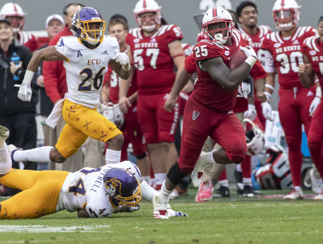 Former Pack running back Reggie Gallaspy Jr. and NC State ran over ECU to end last season, 58-3.