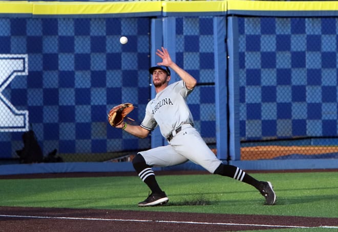 South Carolina left fielder Noah Myers played a tricky bounce in left field during the Gamecocks' 12-6 win over the Wildcats on Friday night at Kentucky Proud Park.