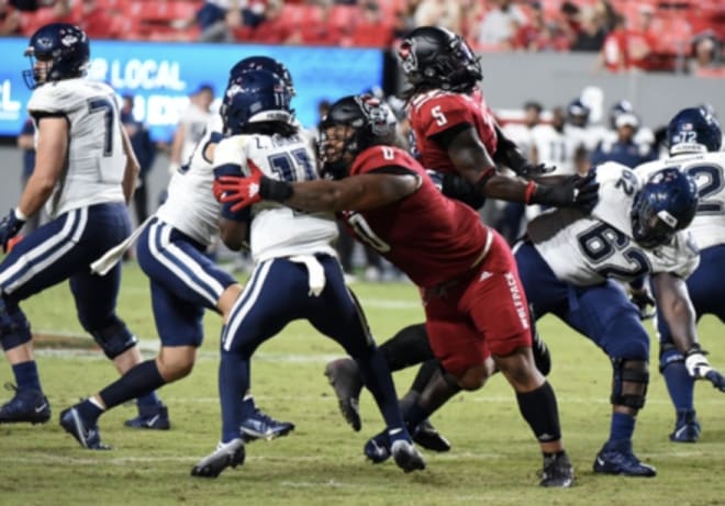 NC State redshirt sophomore nose tackle Joshua Harris recorded his first career sack Saturday against Connecticut in Raleigh.