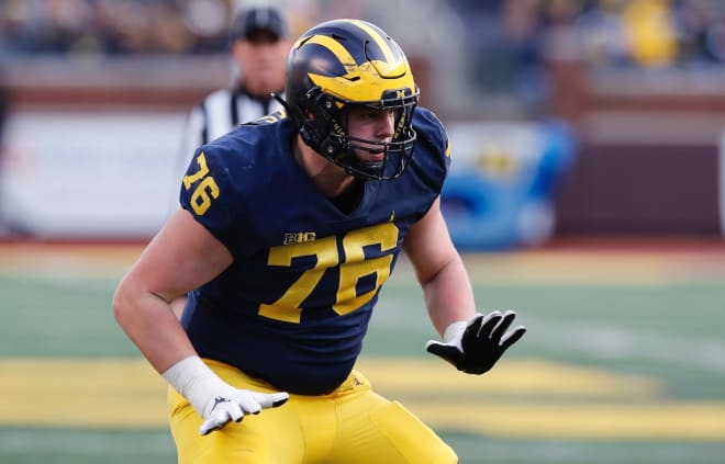 Michigan Wolverines redshirt freshman tackle Ryan Hayes has packed on nearly 30 pounds. Senior guard Ben Bredeson called him a future star.