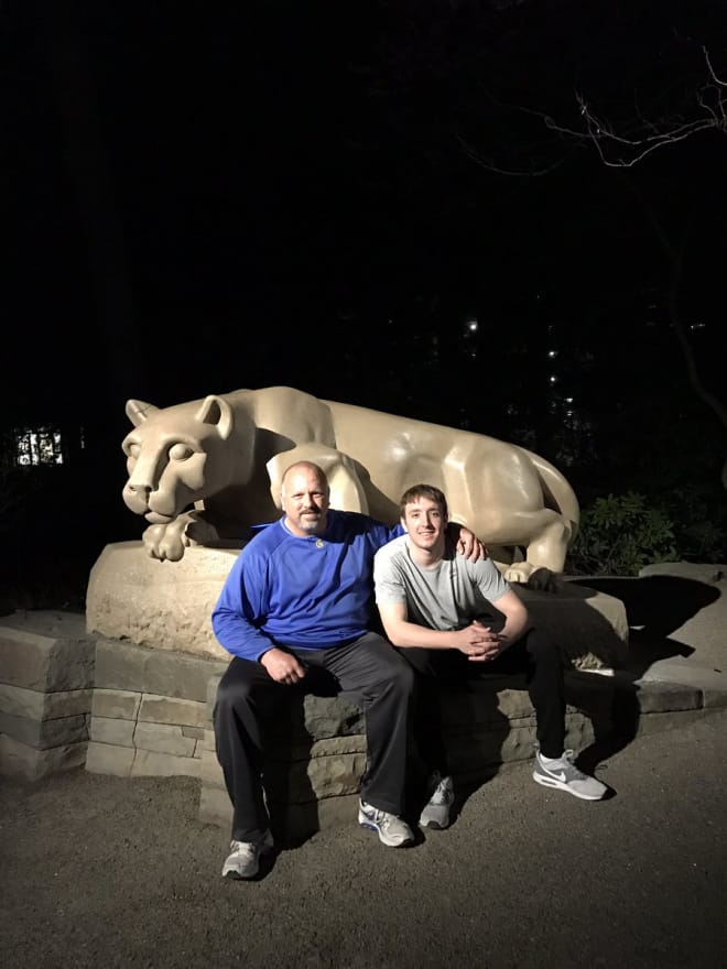 Lazenby with his dad at the Lion Shrine this week. (Twitter)