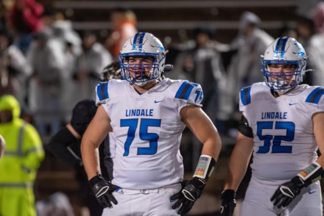 Lindale (Texas) High School offensive lineman Casey Poe (75) with teammate Will Hutchens (52). (Photo courtesy of Casey Poe)