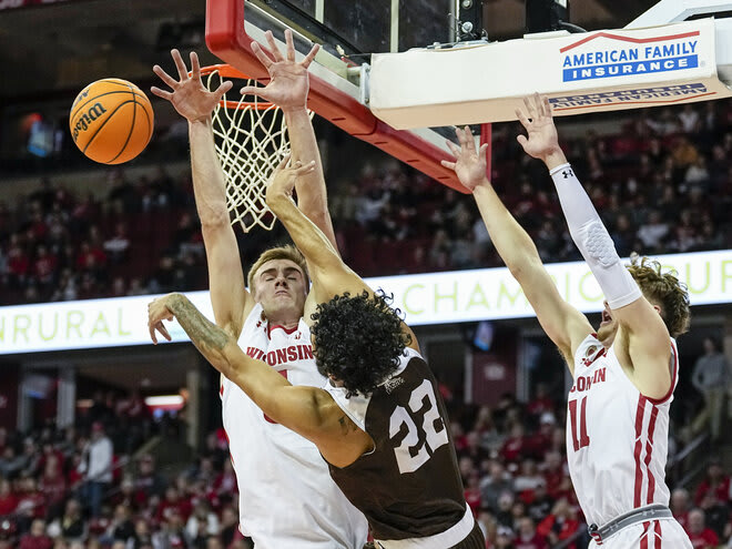 Wisconsin's Tyler Wahl, left, blocks out Lehigh's Tyler Whitney-Sidney (22) during the first half.