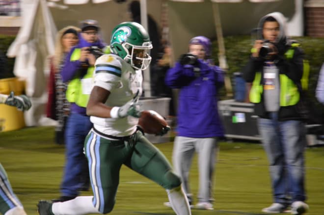 Tulane quarterback Jonathan Banks scores the game winning touchdown in overtime to beat ECU.