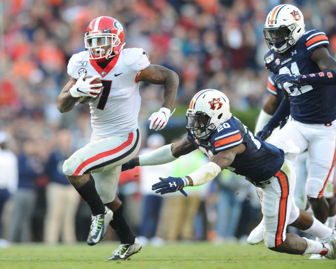 D'Andre Swift picks up yardage against Auburn.