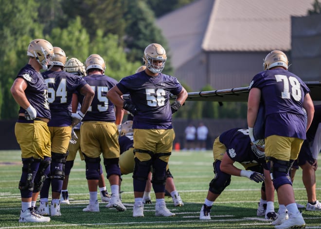 Notre Dame freshman offensive tackle Charles Jagusah (56) waits his turn to take a practice rep.