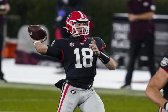 Georgia Bulldogs quarterback JT Daniels (18) throws a touchdown pass against the Mississippi State Bulldogs during the first half at Sanford Stadium. Mandatory Credit: Dale Zanine-USA TODAY Sports