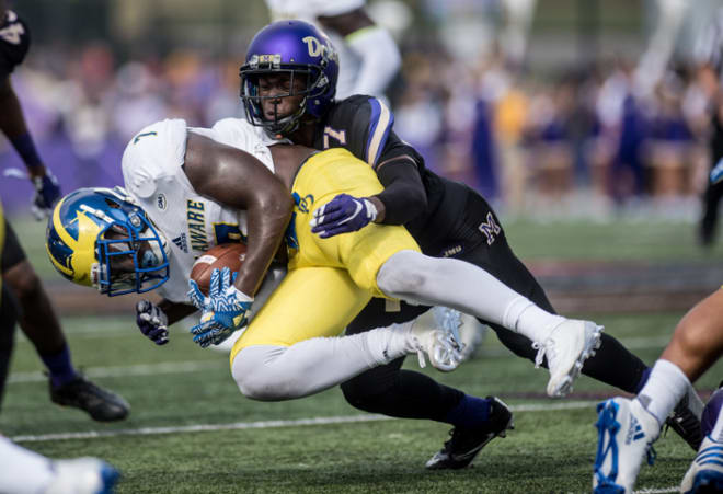 Jimmy Moreland makes a tackle during JMU's Oct. 1 win over Delaware.
