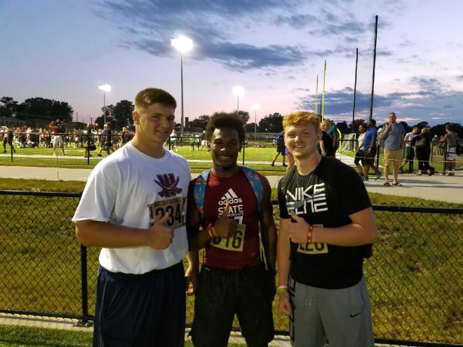 Brennan Armstrong (left) with Austin Beier (right) and Jornell Manns (middle).