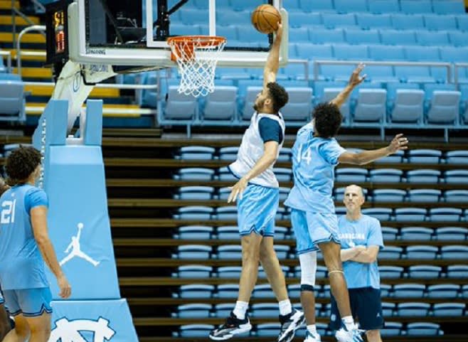 New UNC forward Pete Nance (middle) was Honorable Mention All-Big Ten last year at Northwestern.