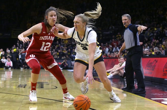 Iowa s Sydney Affolter (3) drives to the basket defended by Indiana s Yarden Garzon (12) Saturday, Jan. 13, 2024 at Carver-Hawkeye Arena in Iowa City, Iowa.