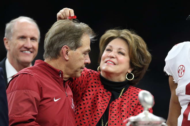 Terry Saban pulls a piece of confetti off of the head of Alabama Crimson Tide head coach Nick Saban after the game against the Clemson Tigers in the 2018 Sugar Bowl college football playoff semifinal game at Mercedes-Benz Superdome. Photo | Chuck Cook-USA TODAY Sports