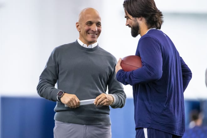 New Notre Dame athletic director Pete Bevacqua (left) catches up with former Irish quarterback Sam Hartman at Notre Dame's Pro Day last month.