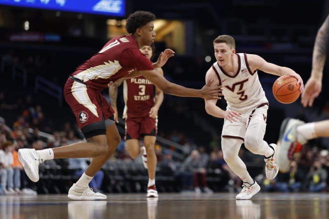 Virginia Tech Hokies guard Sean Pedulla (3) drives to the basket s Florida State Seminoles forward Baba Miller (11) defends in the first half at Capital One Arena. Mandatory Credit: Geoff Burke-USA TODAY Sports