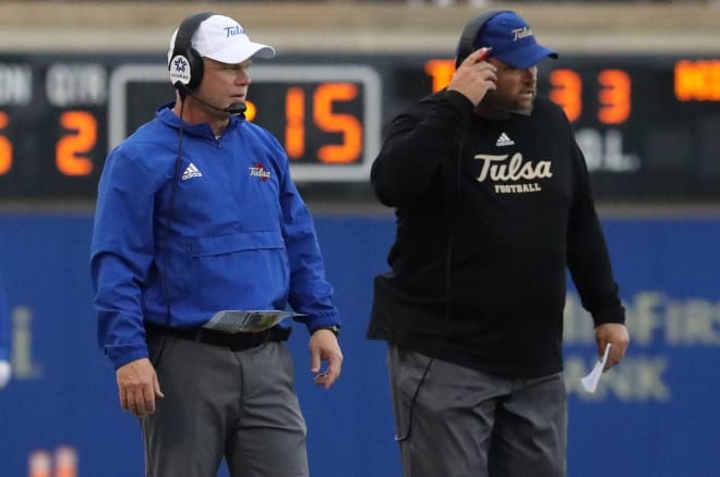 Tulsa head coach Philip Montgomery and OL coach Steve Farmer.