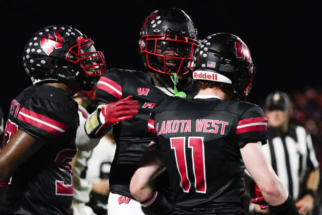 Liberty Township (Ohio) Lakota West High School defensive back Taebron Bennie-Powell (center) is set to announce his college decision on Wednesday.