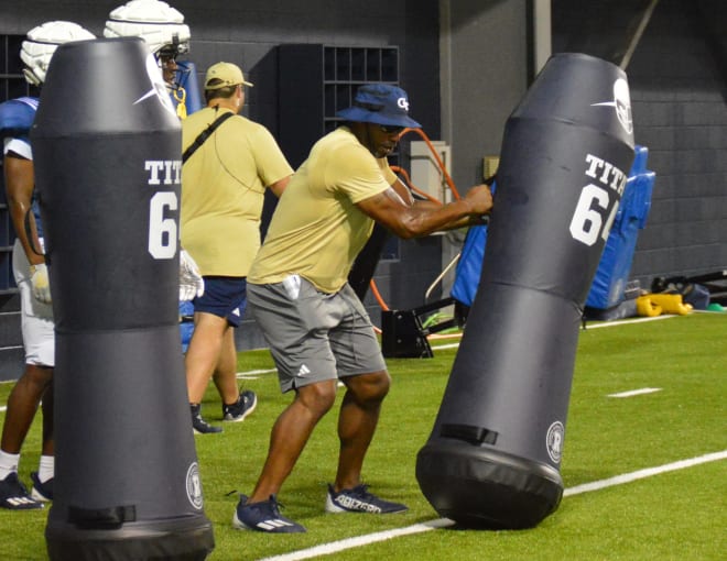 Marco Coleman demonstrates how to do a drill during practice last week