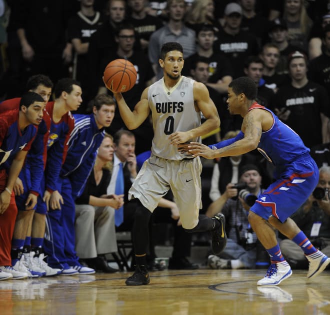 CU's Askia Booker dribbles the ball during the Buffs' 75-72 upset of No. 6 Kansas in Boulder on Dec. 7, 2013