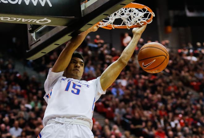 Boise State guard Chandler Hutchison dunks against San Diego State during the second half of an NCAA college basketball game Saturday, Feb. 27, 2016, in San Diego.