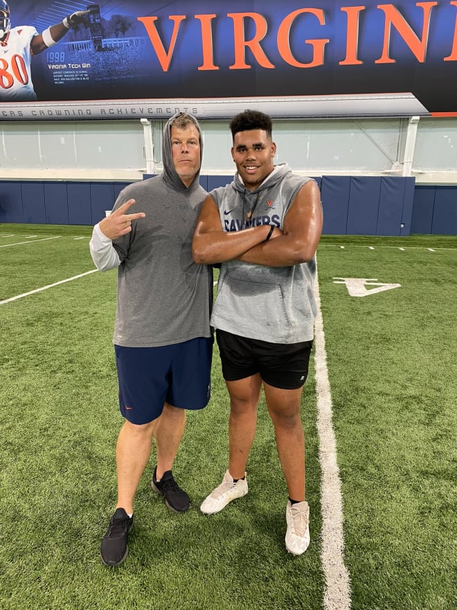 Five-star tackle Zach Rice poses for a picture with UVa OL coach Garett Tujague.