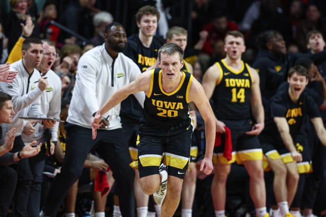 Payton Sandfort celebrates a big shot in Iowa's win over Rutgers. 