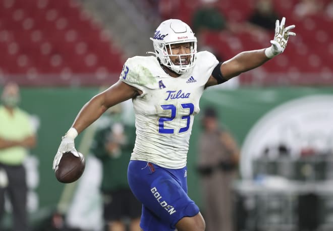 Zaven Collins celebrates after returning an interception for a touchdown against USF.