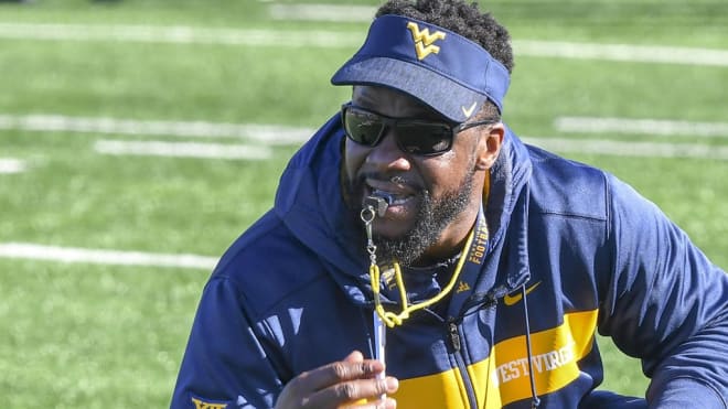 Al Pogue most recently coached linebackers at West Virginia, but coached cornerbacks at Troy from 2014-18.