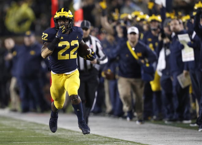 Michigan Wolverines football running back Karan Higdon ran for 200 yards and two touchdowns in a win over Minnesota.
