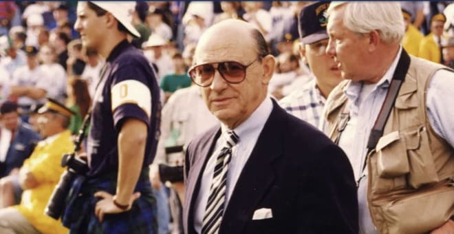 Roger Valdiserri roaming the sidelines at a Notre Dame football game.