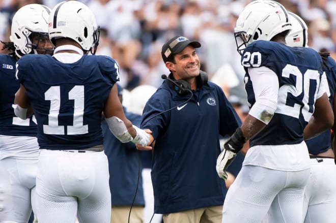 Penn State defensive coordinator Manny Diaz talks to his unit on the sideline versus Indiana on Nov. 28, 2023.